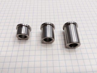 Boccola flangiata in inox aisi 316 e con foro diametro 6,75 mm con diametro tassello 12 mm con flangia diametro 14x2 lunghezza totale 12 mm